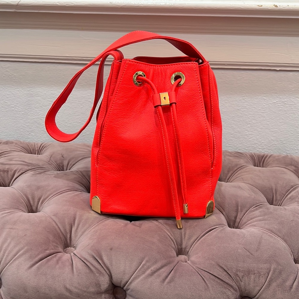 Vince Camuto neon red-orange bucket bag